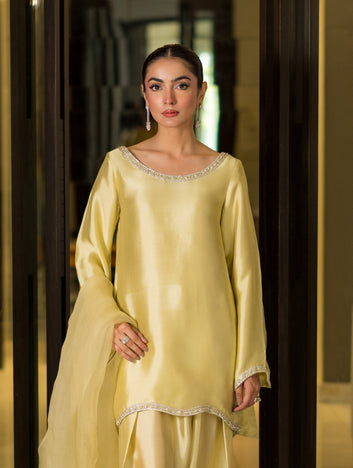 Close-up of Marwa Lemon Yellow Hemel Silk shirt with handmade embellishments by WEAR AGAIN